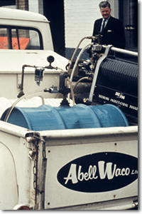 An Abell truck showcases a Seeburg fogging machine, a versatile tool of its time. 