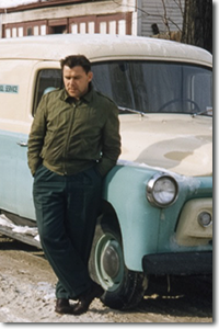 Bill McCallum, the inaugural branch manager of the Toronto branch (left), and Ted Bezance, a skilled service technician who joined after returning from the war (right), stand beside an International Harvester truck.